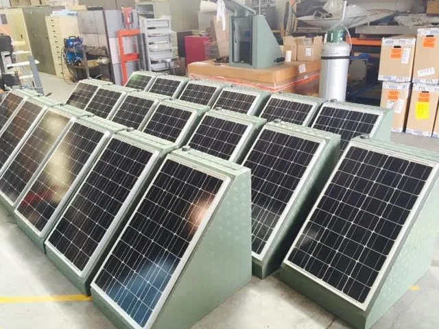 A batch of solar-powered seismograph enclosures on the workshop floor