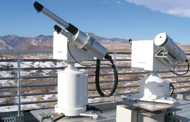 Solar radiation and atmospheric monitoring instruments on a rooftop
